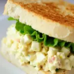 This easy and customizable egg salad sandwich is perfect for a quick lunch or a picnic meal!