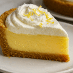 Ohio Lemon Pie slice close-up with graham crust and whipped topping
